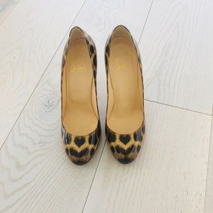 Christian Louboutin leopard pumps.